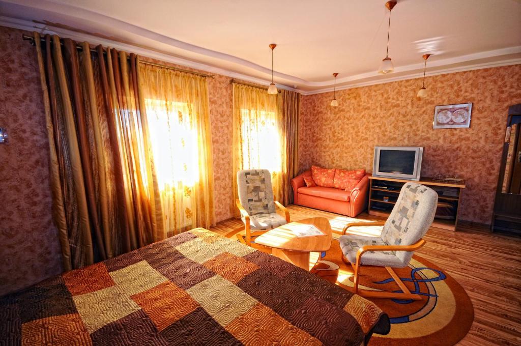 Magnat Hotel Muncaci Cameră foto