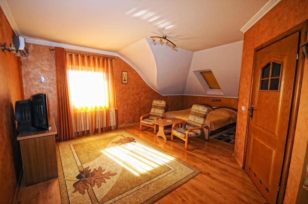 Magnat Hotel Muncaci Cameră foto
