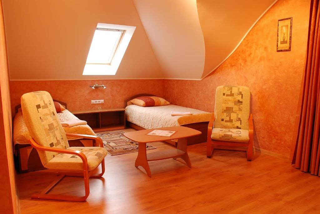 Magnat Hotel Muncaci Cameră foto